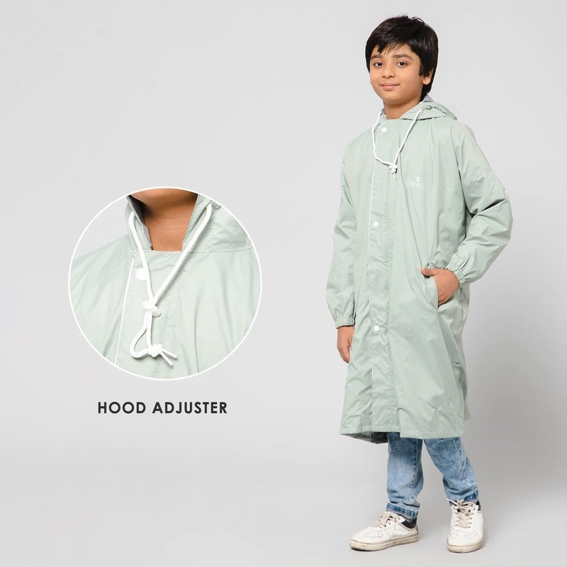 THE CLOWNFISH Cloud Chaser Series Kids Raincoat Waterproof Polyester Double Coating Reversible Longcoat with Hood and Reflector Logo at Back. Printed Plastic Pouch. Kid Age-9-10 years (Pista Green)